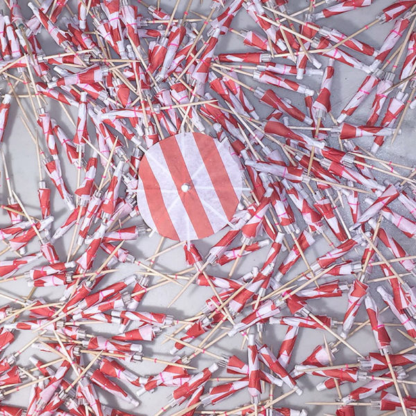 Red & White Striped Cocktail Umbrellas Open with Closed